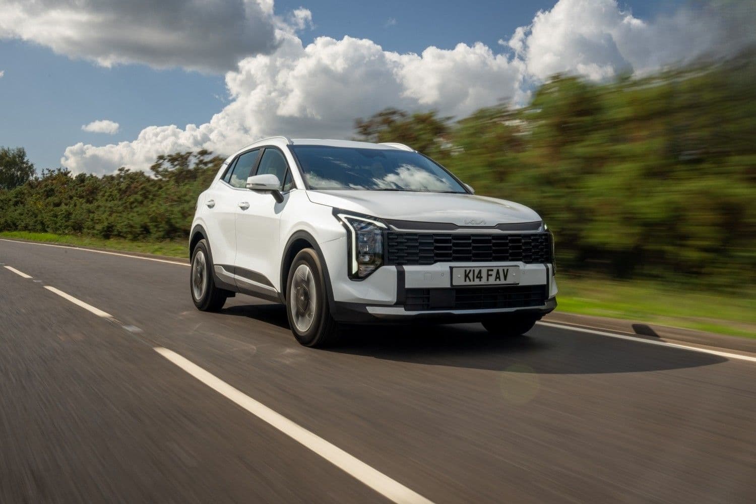 Kia Sportage Hybrid family SUV front three-quarter view